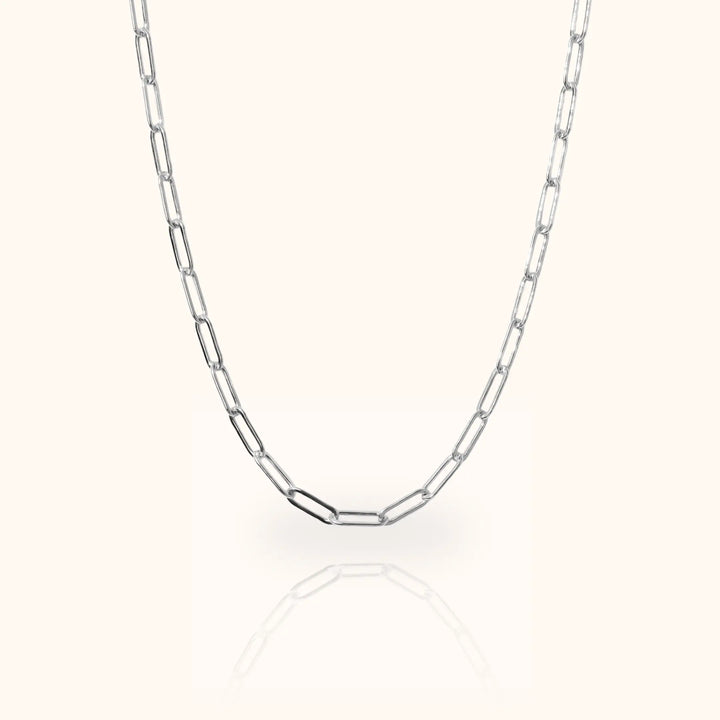 Silver chain necklace on a white background